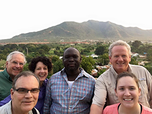 A group shot from our trip in January, with Okeno at center. This was taken on the rooftop of his office building in Voi after a day spent looking through gemstone rough. (Photo credit: Dan Lynch)