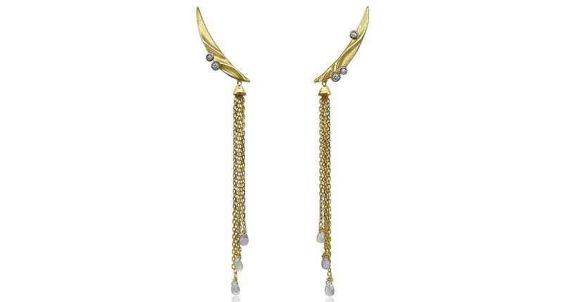 <a href="http://www.k-mita.com" target="_blank" rel="noopener noreferrer">K. Mita</a> Moon River climber earrings in 18-karat yellow and white gold with sapphire briolettes and diamonds ($2,290)