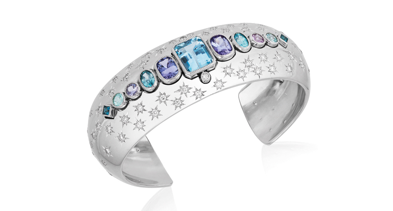 <strong>Best Use of Platinum and Color.</strong> Deirdre Featherstone of Featherstone Design’s platinum “Wonder Woman” cuff featuring 4.54 carats of aquamarine, 2.44 carats of tanzanite, 1.60 carats of blue zircon, 0.46 carats of lavender spinel, 0.68 carats of tourmaline and 2.64-carats of star-set diamonds