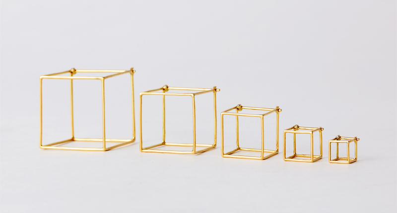 These are Shihara’s 3-D Square earrings, made of 18-karat yellow gold. Sold as singles, they come in a range of sizes and retail between $310 and $733.