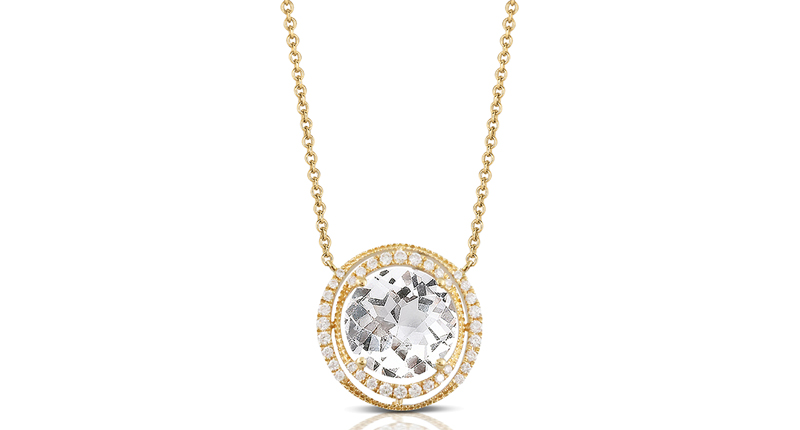 <a href="http://www.dovesjewelry.com" target="_blank" rel="noopener noreferrer">Doves Jewelry</a> 18-karat yellow gold and diamond necklace with a white topaz at center ($1,500)