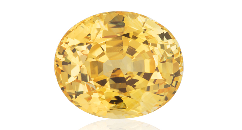 <strong>Classic Gemstone, First Place.</strong> Kenneth Blount of 100% Natural Ltd.’s 91.36-carat unheated yellow Ceylon sapphire