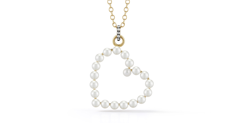 <p>Jemma Wynne 18-karat gold, pearl, diamond and rhodium heart pendant ($2,100)</p>