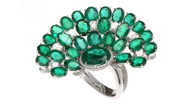 <a href="https://coomi.com/" target="_blank" rel="noopener noreferrer">Coomi</a> Trinity ring with oval emeralds and diamonds set in 18-karat white gold ($90,000)