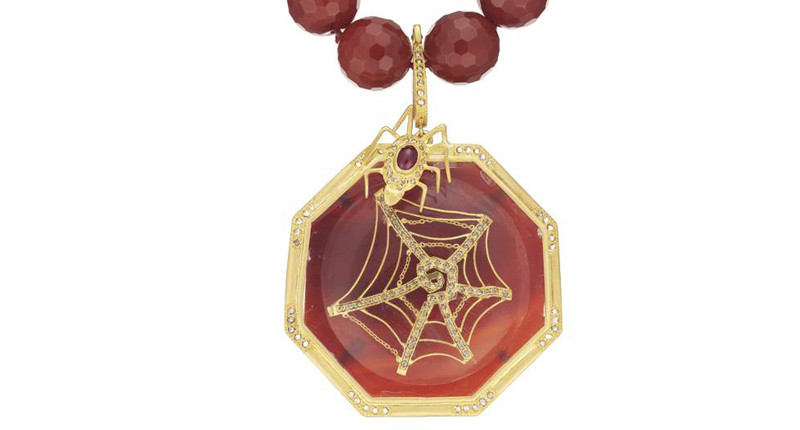 <a href="https://www.coomi.com" target="_blank" rel="noopener">Coomi</a> Antiquity pendant set in 20-karat yellow gold with spider and web design featuring diamonds, carnelian, ruby and crystal ($16,000)