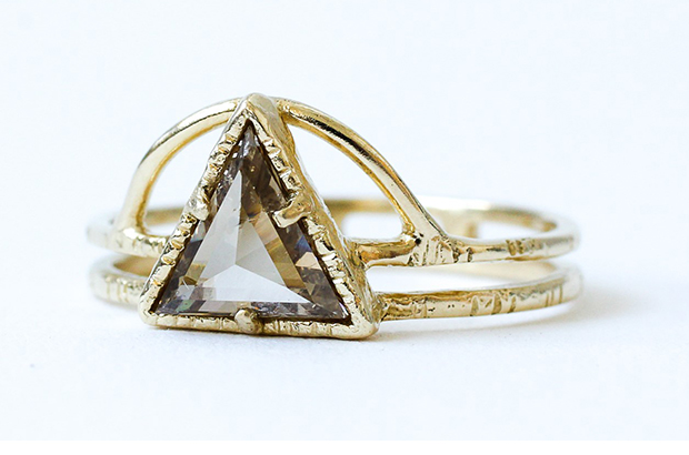 Lio and Linn’s 14-karat yellow gold ring is inspired by nature. The triangle is symbol for change, and arches over the champagne diamond, which represents the sun ($2,200). <a href="http://www.lioandlinn.com/" target="_blank"><span style="color: rgb(255, 0, 0);">lioandlinn.com</span></a>