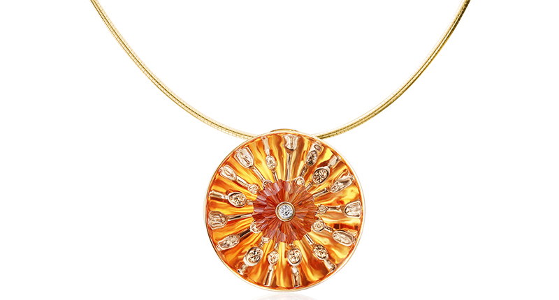 <strong>First place in Jewelry $5,001 to $10,000.</strong> Designed by Thomas Dailing of Lee Ayers Jewelers in Stevens Point, Wisconsin. The “Nova” 14-karat white gold pendant holding an 18.97-carat concave faceted citrine, accented with 33 round diamonds weighing a total 0.85 carats.