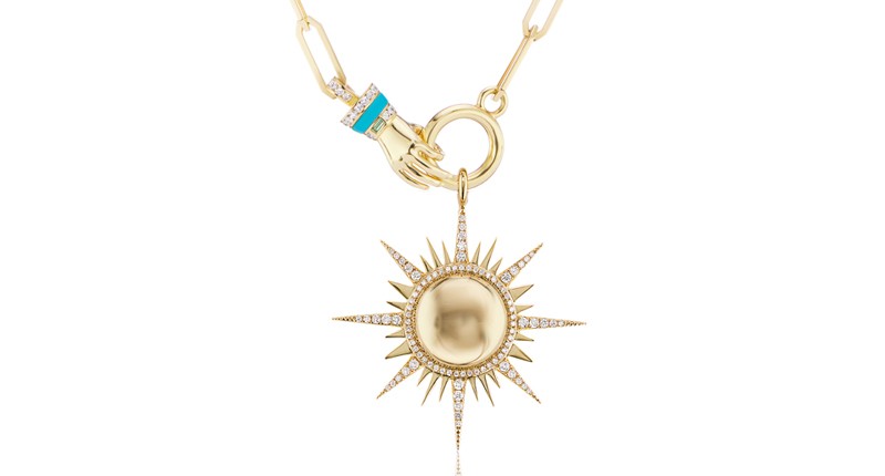 “Il Sole Pendant on Hand Chain” in 18-karat yellow gold with diamonds and turquoise inlay ($13,500)