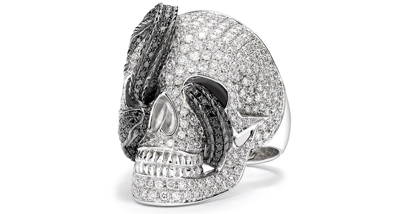 <a href="https://www.theofennell.com/product/diamond-large-skull-black-diamond-snake-ring" target="_blank" rel="noopener">Theo Fennell </a>18-karat white gold, diamond and black diamond skull and snake ring ($18,090)
