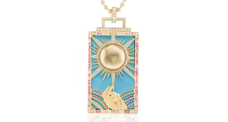 “The Sun,” representing freedom, openness, optimism, enthusiasm, vitality, happiness and confidence, is rendered in 18-karat yellow gold, turquoise, sapphires, diamonds and tsavorite on a 20-inch ball chain ($17,500).
