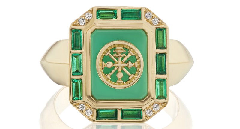 “La Ruota Ring” in 18-karat yellow gold with chyrosprase, diamonds and emeralds ($4,900)