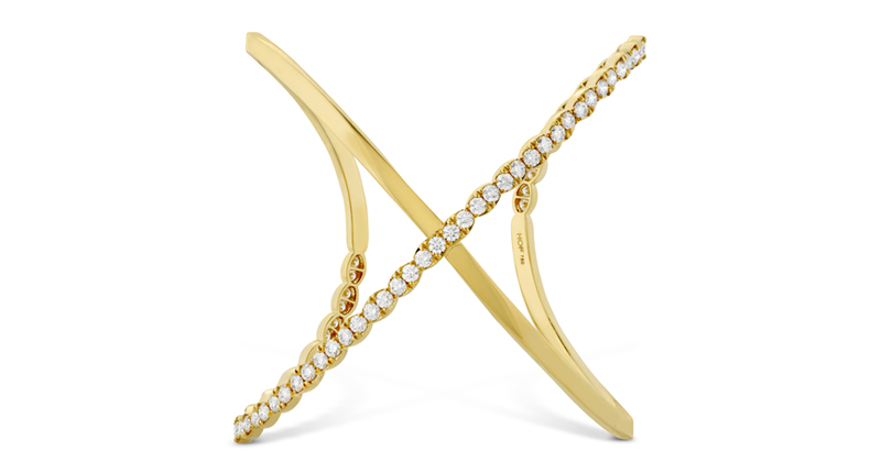 Hearts On Fire’s 18-karat yellow gold Lorelei Criss Cross cuff with 4.20 carats of diamonds