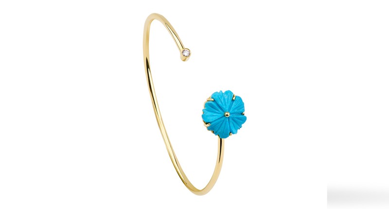 <p><a href="https://www.dimajewellery.com" target="_blank" rel="noopener">Dima Jewellery</a> hand-carved turquoise flower bangle in 18-karat yellow gold ($2,050) </p>