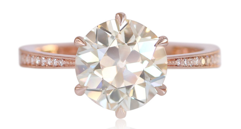 The Laurel Cathedral solitaire from Erika Winters Fine Jewelry is set with a 2.26-carat light yellow old European-cut diamond on an 18-karat rose gold micro-pavé diamond band.