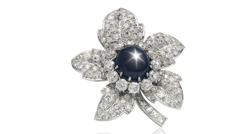 This cabochon black star sapphire and diamond brooch in platinum sold for $20,000.