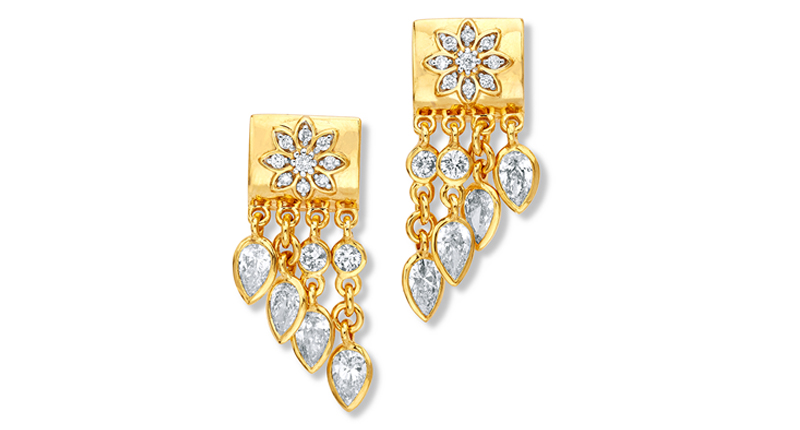 <a href="http://www.buddhamama.com" target="_blank">Buddha Mama</a> 20-karat gold cuff earrings with round and pear diamonds ($12,200)