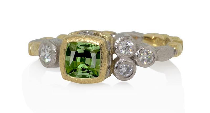 “Skinny Pebbles” ring from <a href="http://ronafisher.com/green-sapphire-skinny-pebbles-ring-diamonds-palladium-18k-gold.html" target="_blank" rel="noopener noreferrer">Rona Fisher</a>, boasting a cushion-cut green sapphire with diamonds set in 18-karat gold and palladium ($2,395)