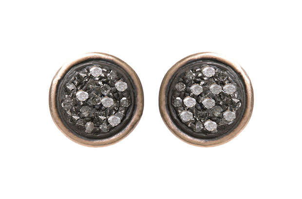 Page Sargisson’s oxidized sterling silver Billie studs with diamonds and an 18-karat gold border ($245)<br />
<a href="http://www.pagesargisson.com/" target="_blank"><span style="color: #ff0000;">PageSargisson.com</span></a>