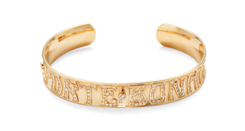 <a href="http://www.marlolaz.com" target="_blank">Marlo Laz</a> 10-karat rose gold “Je Porte Bonheur” pave cuff with champagne diamonds ($7,400)