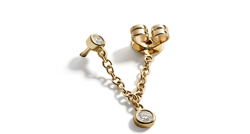 “Lena” 14-karat yellow gold single stud diamond earring, featuring two bezel-set diamonds connected by a solid gold chain ($195)