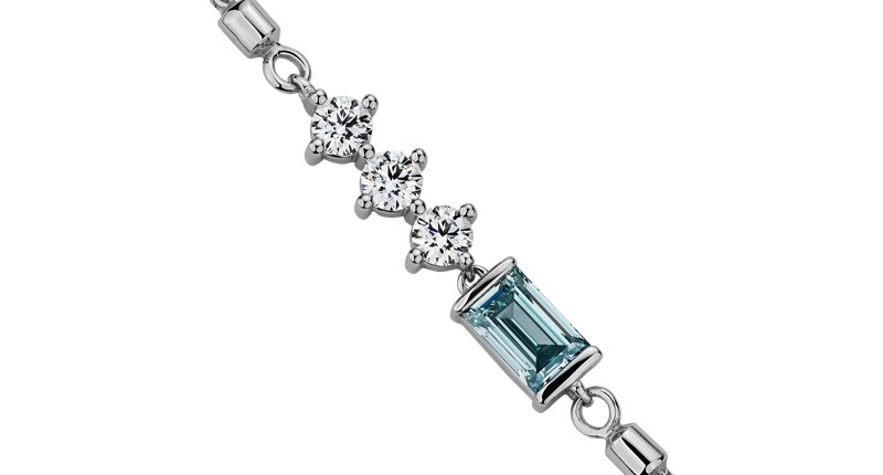 A 14-karat white gold blue and white lab-grown diamond baguette bar bracelet ($1,400)