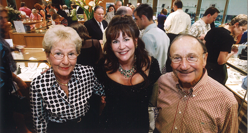 Renee, left, and Howard Zenker sold their jewelry store to Cathy Calhoun in the late ‘90s. Here, they are pictured with the retailer at the grand opening celebration for her store, Calhoun Jewelers.