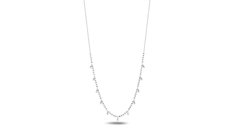 <p>The Aurora necklace features dangling platinum beads and is adjustable in length from choker to 18-inch ($700)</p>
