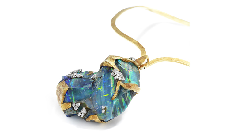 This circa 1972 gold pendant is set with a large, irregular piece of boulder opal that has been realized as a mountain landscape, with textured gold ridges and scattered brilliant-cut diamond “snow” (estimated to sell for $26,100 to $39,200). Opals were one of Grima’s favorite stones.