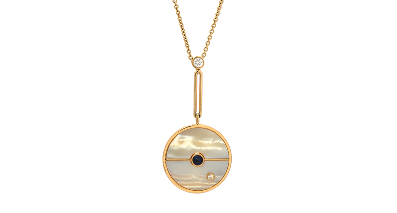 Mother-of-Pearl Globe necklace in 14-karat yellow gold with mother-of-pearl, white diamond and blue sapphire ($1,610)