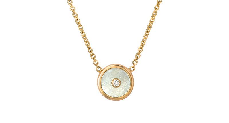 Mini Mother of Pearl Globe necklace in 14-karat yellow gold with mother-of-pearl and white diamond ($635)