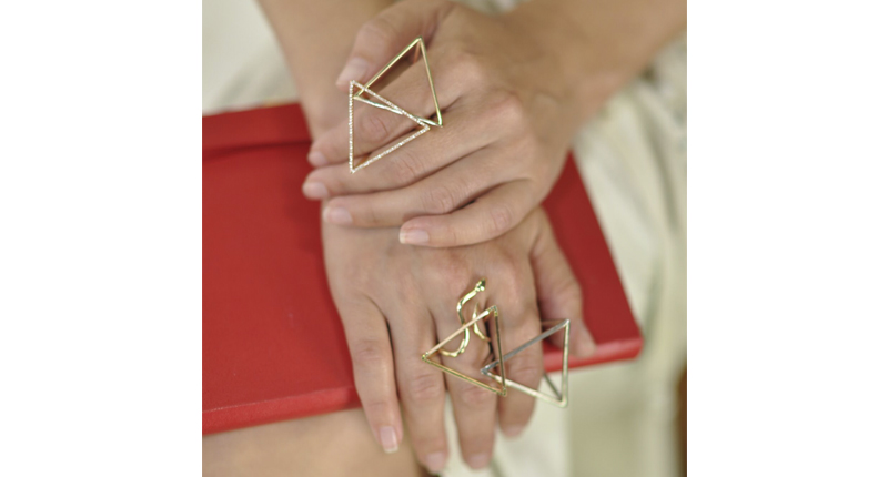 Open triangle rings and bracelets are a Perez Bitan signature that the designer fabricates by hand. 