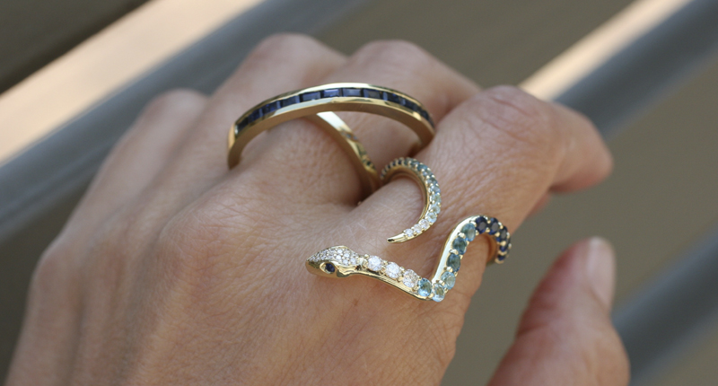 Here a “Queen of the Cosmos” ring, which spins, is paired with a snake ring from the “Diamonds for Lunch” collection.