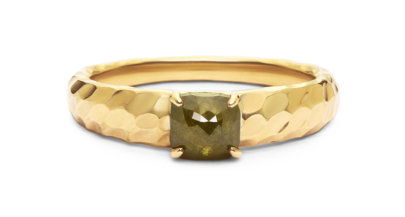 <a href="http://www.danabronfman.com" target="_blank" rel="noopener noreferrer">Dana Bronfman’s</a> solitaire ring in hammered 18-karat yellow gold with a green-hued rose-cut diamond ($1,300)
