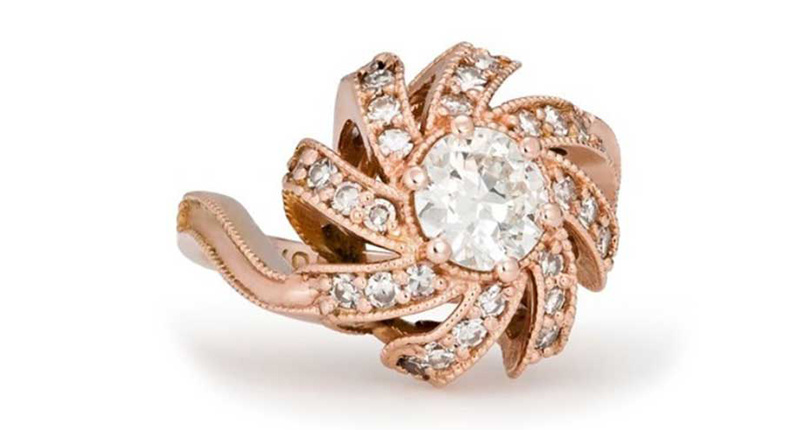 <a href="https://abbysparks.com/custom-jewelry/engagement-rings/amber/" target="_blank" rel="noopener noreferrer">Abby Sparks Jewelry</a> “The Amber” sun-beam inspired engagement ring in 14-karat rose gold with a 0.90-carat round diamond and 1.03 total carats of diamond melee ($14,500)