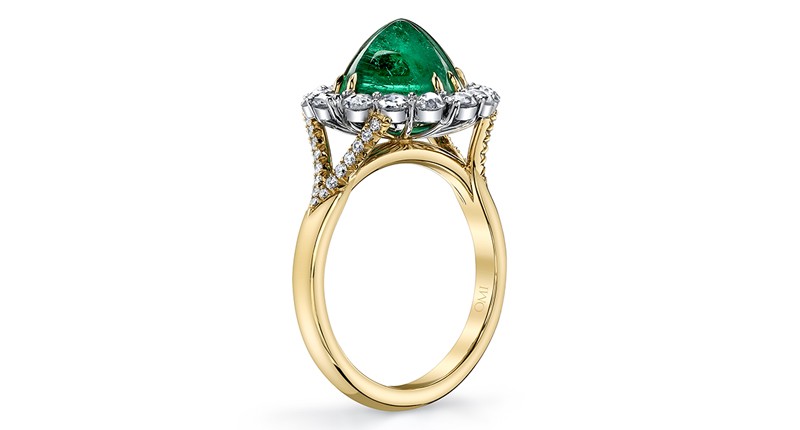 Omi Privé platinum and 18-karat yellow gold ring featuring a 4.58-carat sugarloaf emerald accented with rose-cut diamonds and round diamonds ($39,000)