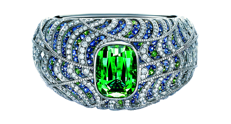 Tiffany & Co.’s Making Waves bracelet features 532 sapphires and 90 tsavorites hand set in platinum with more than 1,324 round brilliant-cut diamonds. The center stone is a 45.55-carat cushion-cut green tourmaline ($395,000).<br />Photo courtesy of Tiffany & Co.