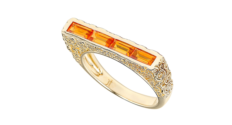 Jane Taylor Jewelry’s “Rosebud” bar ring with mandarin garnet baguettes in 14-karat yellow gold ($2,630)