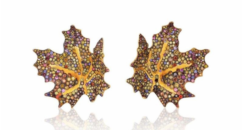 <strong>Best Use of Color.</strong> Naomi Sarna of Naomi Sarna Designs’ maple leaf earrings, featuring multicolored diamonds, sapphires and garnets set in 18-karat and 24-karat yellow gold and 18-karat white gold