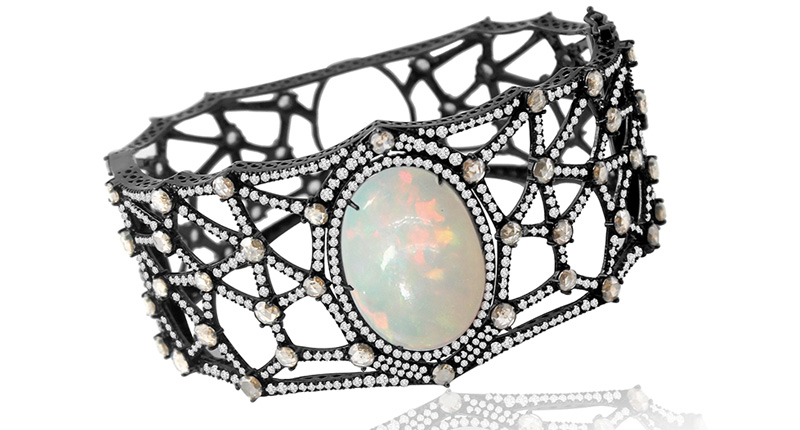 Sutra 20-carat opal cuff with white diamonds and brown rose-cut diamonds set in 18-karat black gold ($29,000)<br /><a href="http://www.sutrajewels.com" target="_blank" rel="noopener noreferrer">SutraJewels.com</a>