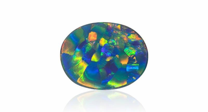 <strong>Phenomenal.</strong> First place in this category went to Joel Price’s 100.66-carat harlequin pattern black opal.