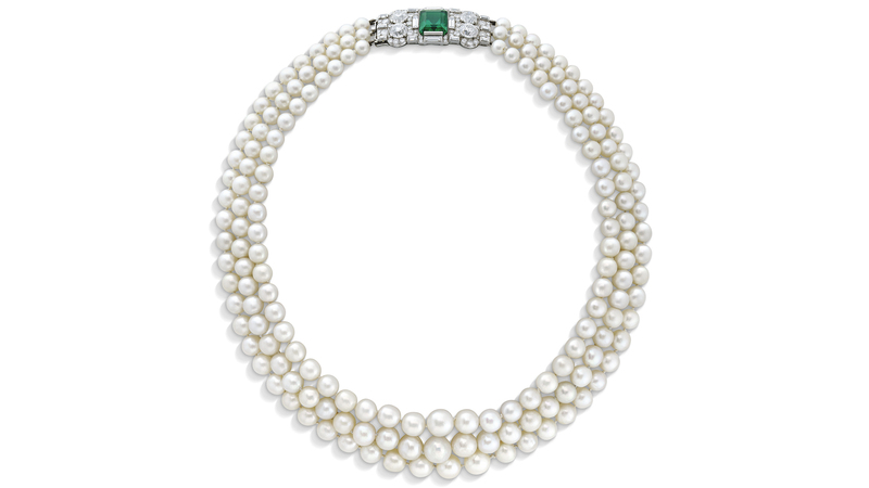 This circa 1930s signed Bulgari necklace from a royal family sold for $511,779. It features three strands of graduated natural and cultured pearls, old- and baguette-cut diamonds, and a rectangular-shaped green doublet.
