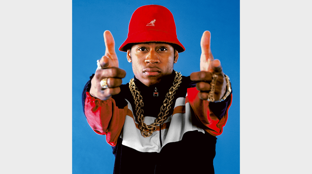 LL Cool J. LL Cool J is one of the most influential rappers when it comes to hip-hop jewelry, wearing four-finger rings and dookie chains alongside some of the most iconic stylings in hip-hop history. Nameplate ring spelling “James,” his first name, double-layered gold rope chains, and Gruen gold nugget watch. (Credit: Janette Beckman, New York, 1988)