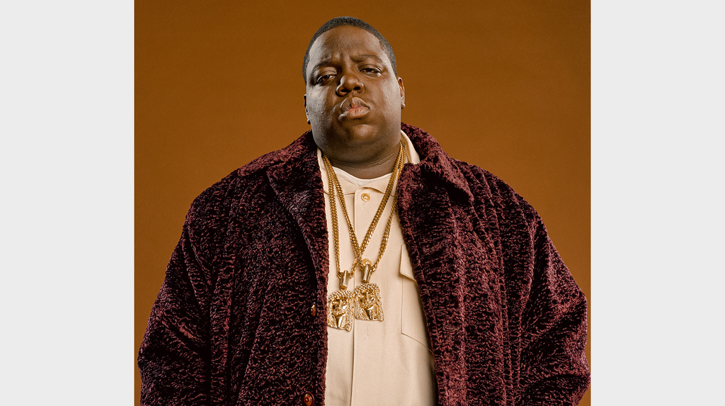 Notorious B.I.G., a.k.a Biggie Smalls. Created by Tito Caicedo of Manny’s New York, Biggie’s Jesus piece set off a trend in hip-hop that is now a staple look for artists. In Jay-Z’s book “Decoded,” he explained how Biggie’s pendant became iconic in hip-hop and a good luck symbol for him (Jay-Z): “The chain was a Jesus piece—the Jesus piece that Biggie used to wear, in fact. It’s part of my ritual when I record an album: I wear the Jesus piece and let my hair grow till I’m done.” The “Jesus piece” is also referenced in the song “Hypnotize,” one of The Notorious B.I.G.’s biggest hits: “So I just speak my piece, keep my peace/Cubans with the Jesus piece, with my peeps...”—The Notorious B.I.G., “Hypnotize” (Credit: Michael Lavine, Queens, New York, 1997)