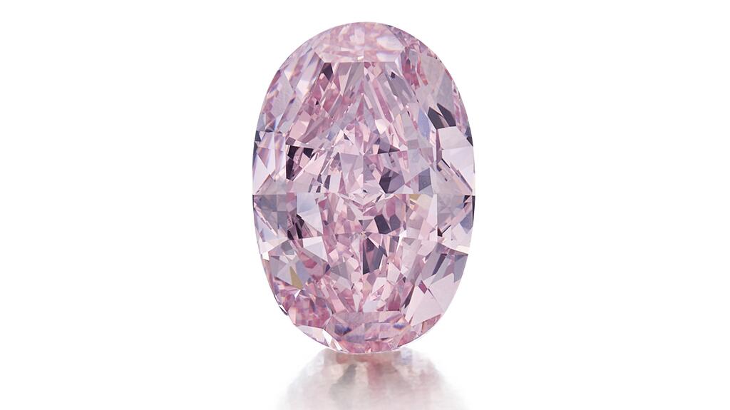A 5.02-carat oval-shaped fancy pink diamond ring Fancy pink diamond ring