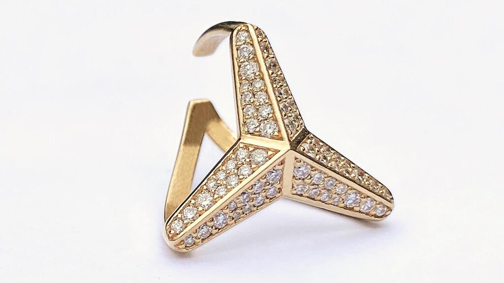Maria Kotsoni Three Pointed Star ear cuff in 18-karat yellow gold with 0.53 carats of white diamonds