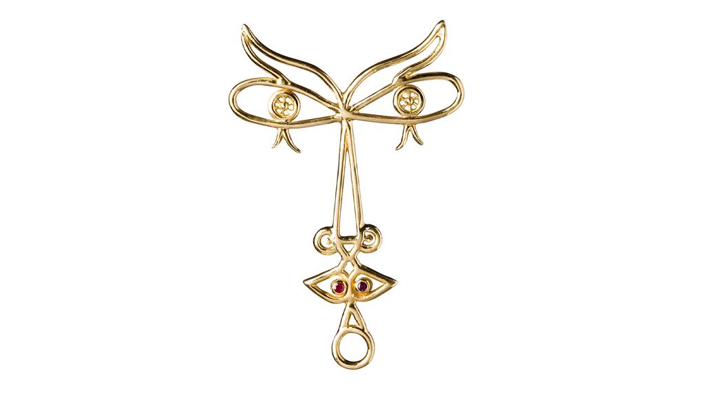 “Madame,” 1960s, is a pendant with gold, rubies, and diamonds, made by Jean Cocteau (1889-1963). Edition 18 of 50 © ARS / Comité Cocteau, Paris / ADAGP, Paris 2024. Photo: Greg Favre Jean Cocteau Madame, 1960s