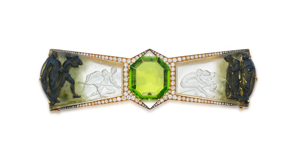 The “Le Vol de la Pierre” brooch by René Lalique René Lalique peridot brooch