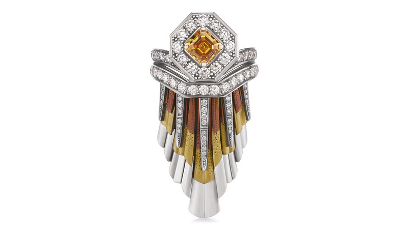 The center stone in the Light Rays Crown Ring is a 1.08-carat square emerald-cut fancy vivid orange yellow diamond ($140,000). The ring can be worn with or without its crown.
