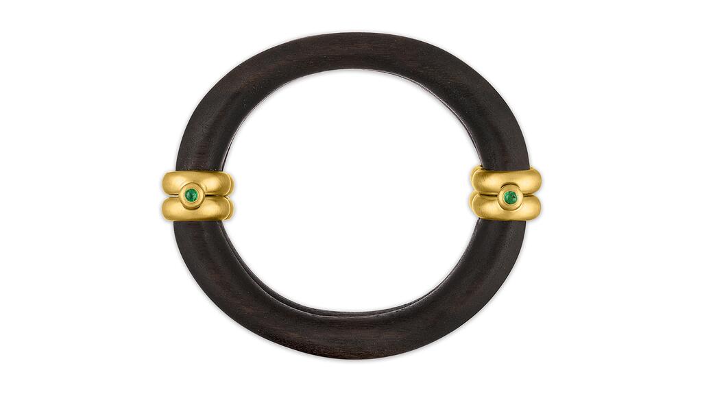 Prounis “Woods Cuff” in reclaimed black walnut with 22-karat gold and emerald