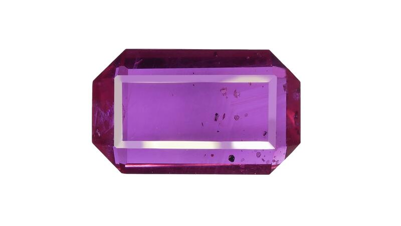 Navneet Gems and Minerals portrait-cut ruby